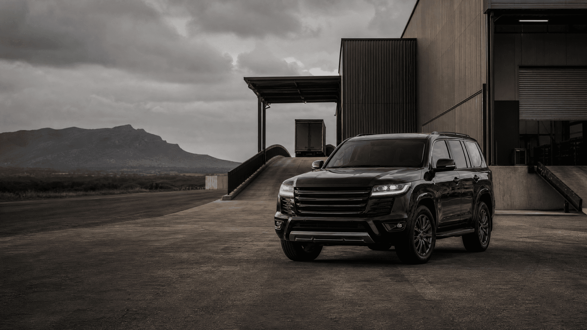 Premium vehicle at a modern automotive facility